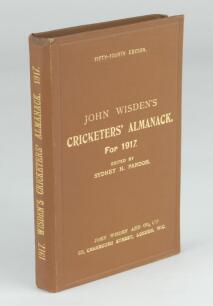 Wisden Cricketers’ Almanack 1917. 54th edition. Original hardback. Very good to excellent condition throughout. A rare wartime hardback edition with gilt titles to front board and spine bright