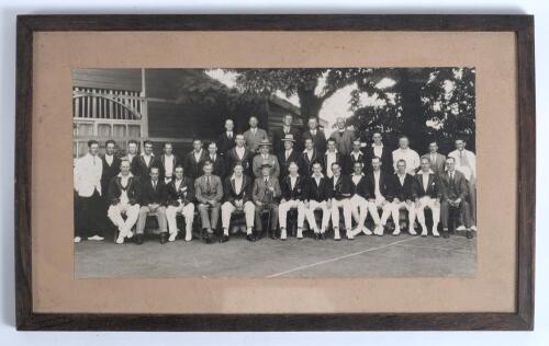M.C.C. tour to Australia 1928/29. Original mono photograph of the M.C.C. and opposing teams and officials in a joint photograph set behind a pavilion.