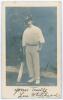 Lees Whitehead. Yorkshire 1889-1904. Mono real photograph postcard of Whitehead standing full length wearing cricket attire and Yorkshire cap, leaning on his bat. Signed in black ink to lower border by Whitehead. Durhams of Leeds. Postally unused. Some si