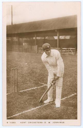 David William Jennings. Kent 1909-1914. Sepia real photograph postcard of Jennings in batting pose wearing Kent cap. Kingsway Real Photo Series no. S11393. Postally unused. Very good condition.