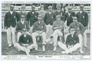 West Indies tour to England 1906. Early mono postcard of the West Indies touring party, depicted seated and standing in rows wearing cricket attire, blazers and assorted headgear. Players&rsquo; names printed to margins of Austin (Captain), Harrigan, Goodman, L