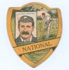 Lord Hawke. Yorkshire & England. Rare early shield shaped trade card with cameo of Hawke, named, to left hand side and image of a cricket match to right. &lsquo;National&rsquo; in strip below. J. Baines Litho, Bradford 1890&rsquo;s. With advertising to reverse. Minor soili