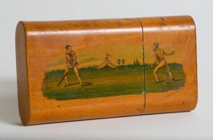 Cricket cigar box. An attractive wooden oblong cylindrical cigar box with a horizontal 19th century cricket scene to the side, in colour, of a bowler about to bowl to batsman, cricket tent and trees to background. The scene entitle &lsquo;Play&rsquo; to lower border.