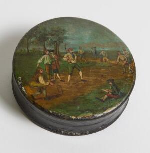 Cricket snuff box. Circular early Victorian black lacquered papier mache snuff box. Hinged lid painted with a colour cricketing scene, after Hayman&rsquo;s painting of 1740. The box measures 2.75&rdquo; diameter. Minor wear to image and extremities of the box otherwi