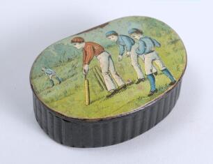 Cricket snuff box. An oval black lacquered papier mache snuff box with hinged lid, believed to be circa 1870&rsquo;s. The lid painted with a cricketing scene of boys playing cricket with trees in background. The box measures approx 2.5&rdquo; x 1.75&rdquo;x .75&rdquo; deep. Some