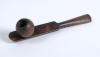 Cricket pipe. Rosewood smoking pipe comprising a stem shaped cricket bat and the bowl shaped as a cricket ball. The pipe was produced by Lowe & Co of London, with emblem &lsquo;L & Co&rsquo; in oval to stem of the pipe. Circa 1890&rsquo;s. 4.5&rdquo; long. Good condition