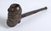 W.G. Grace smoking pipe 1895. Vulcanite cricket pipe with cricket bat shaped stem and &lsquo;Grace head&rsquo; pipe bowl with ball foot to base. Stamped &lsquo;W.G.G. ET.47. A.D. 1895&rsquo;. &lsquo;Centuplico&rsquo; and &lsquo;Made abroad&rsquo; to back of the bat. 5.5&rdquo; long. Good condition
