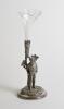 W.G. Grace. A silver plated tulip vase cast in the form of W.G. Grace, full length standing in classic pose with cricket bat in front of a tree. With original glass flute in holder to top of tree. Circa 1900 with number &lsquo;11445&rsquo; to base and makers marks to