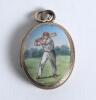 Cricket locket. Silver base metal oval shaped opening locket with enamelled (?) figure of a batsman playing a shot to lid, decorative floral back. Date unknown circa 1940/50&rsquo;s (?). Minor signs of wear otherwise in good condition