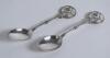 Cricket spoons. A pair of silver plated spoons each with a similar figure of a batsman at the wicket to top of handle. Sold with a small ceramic cricket cup with image of a batsman and a golfing saucer, cracks to the saucer. G