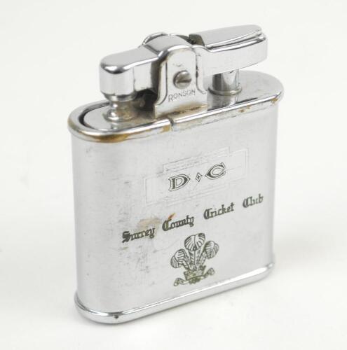 Surrey County Cricket Club. Ronson cigarette lighter produced to commemorate Surrey&rsquo;s County Championship win in 1956. With Surrey emblem, club name and initials &lsquo;D.C.&rsquo; (Dennis Cox?) to one side. To the other &lsquo;County Champions 1952, 1953, 1954, 1955, 1956
