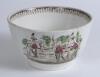 Village cricket bowl. Staffordshire 19th century bowl, transfer printed in sepia with three scenes of village cricket, with church and tents to background, to sides, floral and oak leaf inner rim decoration. Hand coloured in green and burgundy. Approx 6.5