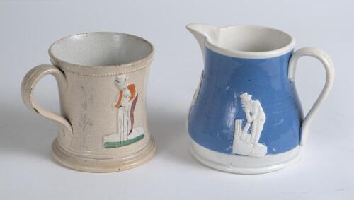 Cricket jug. Unusual early Staffordshire blue cream/milk cricket jug with strap handle, three raised figures of cricketers on a mid blue background. c1870/80. 4&rdquo; tall. Some firing faults to jug surface otherwise in good/very good condition. Sold with a St