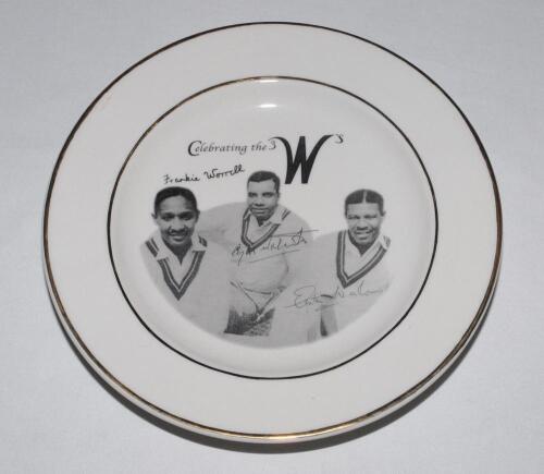 &lsquo;Celebrating the 3 W&rsquo;s&rsquo;. Dinner plate with transfer image of Frank Worrell, Cylde Walcott and Everton Weekes with facsimile signatures and title. Gold lustre to rim. Registration mark to underside, &lsquo;100&rsquo;. Maker unknown. 10&rdquo; diameter. Very good condition.