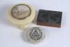 Cricketing pot-lid. Original circular pot-lid printed in black with crossed bats, stumps and balls within a cartouche.