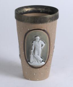 Doulton Lambeth stoneware beaker, moulded in relief with three figures in roundels of a batsman (W.G. Grace) in different poses and impressed star shaped motif on a brown background. Doulton Lambeth impressed marks to base, date 1881, and makers marks to 