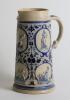 Westerwald cricket jug. Large and very attractive Westerwald cobalt blue stoneware cricket jug, moulded in relief with six cameo panels of a batsman, fielder and wicket-keeper, believed to be W.G. Grace, in different cricketing poses. plus two smaller cam