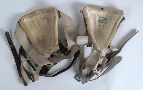 Arthur Percy Frank Chapman. Cambridge University, Kent & England 1920-1938. Batting protector formerly used by Chapman during his playing career. The aluminium protector has a covering of white leather and is secured by straps and buckles around the waist