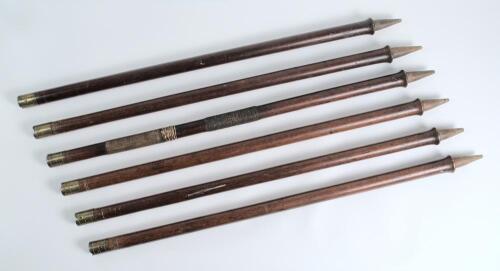 Cricket stumps circa 1870&rsquo;s. Six circular cricket stumps used during this early period. All six of the stumps are marked with the makers name E.J.Page, Kennington Oval, Surry [sic]. The stumps are capped by a brass band with four small engraved channels b