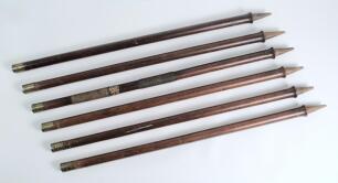 Cricket stumps circa 1870&rsquo;s. Six circular cricket stumps used during this early period. All six of the stumps are marked with the makers name E.J.Page, Kennington Oval, Surry [sic]. The stumps are capped by a brass band with four small engraved channels b