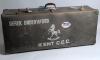 Derek Leslie Underwood. Kent & England 1963-1987. Two cricket coffins, one in brown decorated in M.C.C./ England colours with &lsquo;D. Underwood M.C.C. Team&rsquo; stencilled to lid. Luggage identity tag attached to handle with Underwood&rsquo;s name &lsquo;c/o International Wa - 4
