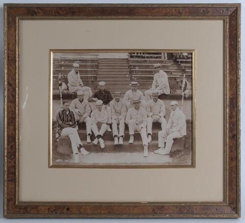 Cambridge University 1898. Early original sepia photograph of the Cambridge University team seated in rows on the steps of a pavilion, apparently at Aigburth, Liverpool, wearing cricket attire, blazers and assorted headgear. Notable players include the ca