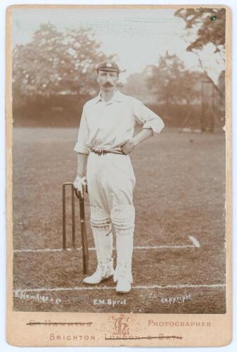 Edward Mark Sprot. Hampshire 1898-1914. Original sepia cabinet card photograph of Sprot, full length in batting attire and Hampshire cap, stood at the wicket. Name printed to lower edge of photograph. E. Hawkins & Co. of Brighton. Card measures 4.25&rdquo;x6.25