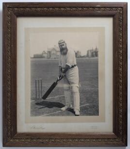 William Gilbert Grace, Gloucestershire, London County & England 1870-1908. Excellent original sepia photograph of Grace in batting pose at the wicket. The photograph laid down to official photographers mount with photographer&rsquo;s name, E. Hawkins & Compy of