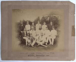 &lsquo;England v Australians, 1884&rsquo;. Early original sepia photograph of the England team who played Australia in the 2nd Test at Lord&rsquo;s 21st- 23rd July 1884, standing and seated in rows wearing blazers, caps and cricket attire. The photograph laid down to offic