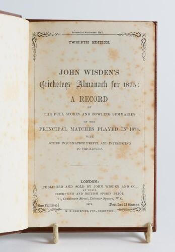 Wisden Cricketers&rsquo; Almanack 1875. 12th edition. Bound in brown boards, lacking original paper wrappers, with title and date in gilt to spine, red speckled page edges. Pages checked, complete. Light foxing to the title and the &lsquo;contents&rsquo; pages and to a les