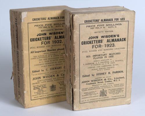 Wisden Cricketers&rsquo; Almanacks 1923 and 1932. 60th & 69th editions. Original paper wrappers. The 1923 edition with breaking to spine block, loss to spine paper otherwise in good condition, the 1932 edition with slight breaking to spine block and some loss t