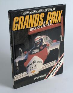 &lsquo;The Hamlyn Encyclopedia of Grands Prix. David Hodges 1988. Signed to pages and pictures by many of the drivers featured. Signatures include Berger, Brabham, Brooks, Hunt, Watson, Lauda, Mansell, Moss, Patrese, Piquet, Scheckter, Stewart, Surtees, Tyrrell