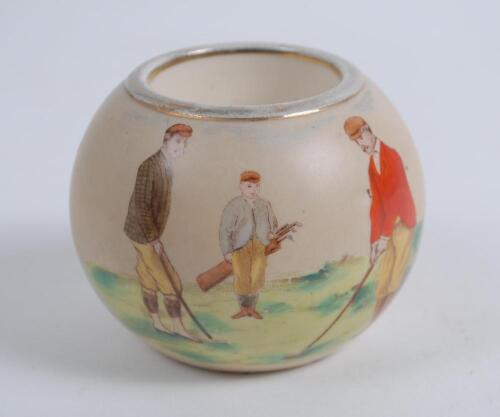 Carltonware stoneware circular match holder c.1906 printed with a colour illustration of two men playing golf and caddie holding the bag. Maker&rsquo;s stamp to base with registration no. 333948. 2.5&rdquo; tall, 2.75&rdquo; diameter. Good condition