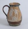 Royal Doulton Lambeth Golf jug. An attractive Royal Doulton Lambeth stoneware jug with strap handle, of bulbous form, with art nouveau design with scrolled foliate borders, enriched in green, blue and brown glazes, with three golfing scenes in white relie - 2
