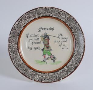 &lsquo;Proverbs&rsquo;. Royal Doulton Series ware plate transfer printed with a panel of a golfer, inscribed Proverbs, If at first you don&rsquo;t succeed try again. A miss is as good as a mile, the base stamped Royal Doulton