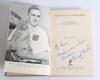 &lsquo;Captain of England&rsquo;. Billy Wright. London 1950. Signed to the title page with dedication by Wright. Hardback lacking dustwrapper. Slight breaking to internal hinges, minor soiling to boards, otherwise in good condition. - 2