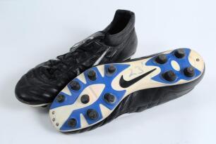 Sol Campbell. Arsenal & England. Pair of Nike football boots worn by Campbell in the 2001-2002 &lsquo;Double Winning&rsquo; season. Number 23 handwritten to the sole of each boot. Sold with a signed note of authentication from Campbell confirming the detail. G