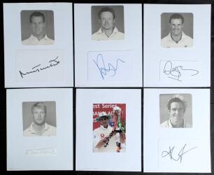 England &lsquo;Ashes&rsquo; winners 2005. Blue file comprising twelve signatures of the England Ashes winning team of 2005, each signed on card or piece and individually laid to a large page below a photographic image of the player. Signatures are Vaughan (signed to 