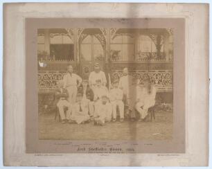 &lsquo;Lord Sheffield&rsquo;s Eleven 1884&rsquo;. Early original sepia photograph of Lord Sheffield&rsquo;s team who played the Australians at Sheffield Park, Uckfield, East Sussex on the 12-14th May 1884, standing and seated, in rows wearing blazers, caps and cricket attire. Th