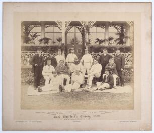 Lord Sheffield&rsquo;s Eleven 1886&rsquo;. Original sepia photograph of Lord Sheffield&rsquo;s team who played the Australian Eleven at Sheffield Park, East Sussex on the 13-15th May 1886, standing and seated, in rows wearing blazers, caps and cricket attire. The umpires a