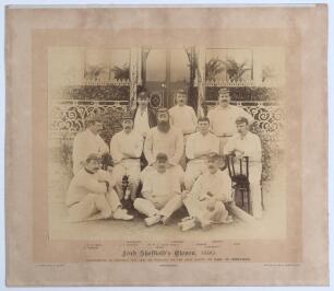 &lsquo;Lord Sheffield&rsquo;s Eleven 1890&rsquo;. Original sepia photograph of Lord Sheffield&rsquo;s team who played the Australian Eleven at Sheffield Park, East Sussex on the 8-10th May 1890, standing and seated, in rows wearing blazers, caps and cricket attire. The photograp