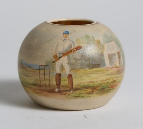 Cricket. Unusual Victorian stoneware circular match holder printed with attractive full length colour image of an early batsman standing at the wicket holding his bat, with tent and woods to background, crossed bat and stumps to verso. The match holder st