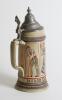 German beer stein. A striking German-made stein circa 1880s. Classic German stoneware with a pewter lid and decorated with colourful images in panels of cricket, football, tennis, croquet and hockey. Around the base is the German motto &lsquo;Maass und Ziel das - 3