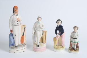 Continental cricket figure. Early bisque cricketing figure of an early bowler on naturalistic base, wearing a white cap, blue spotted shirt with light blue tie, white trousers, colourful sash, standing with a blazer to one side and wicket and bat to the o