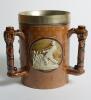 Doulton Lambeth stoneware tyg. Large and impressive three handled tyg with three moulded relief vignettes of cricketers, a batsman, a fielder and wicket keeper in white on a green cameo background, the sides highly decorated in a small floral pattern in b - 3