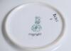 &lsquo;Out for a Duck&rsquo; Royal Doulton Black Boy saucer, entitled &lsquo;Out for a Duck&rsquo; printed with a boy in red shirt and a floppy hat in batting pose having attempted a big shot, looking back to see the ball hit his wicket. Green floral decoration to edge. 5.5&rdquo; dia - 2