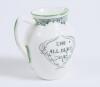 &lsquo;Good for Fifty&rsquo; Royal Doulton Black Boy miniature bulbous jug, entitled &lsquo;Good for Fifty&rsquo; printed with a boy in red shirt and a floppy hat in batting pose in front of the wicket to one side and to the other, a crest with &lsquo;The All Black Team&rsquo;. Green floral - 2
