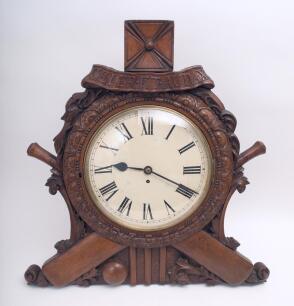 Cricket clock circa late 19th early 20th Century. Very large and impressive Victorian/ Edwardian clock with plain circular face set in an ornate heavy oak wooden frame consisting of carved floral border set on a background of crossed cricket bats, stumps 
