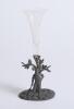 W.G. Grace c1896. Electroplated tulip vase cast with a figure of Grace standing with bat in front of a filigree tree in Art Nouveau style. Stamped &lsquo;W.W.H. & Co&rsquo; (W.W. Harrison & Co, Sheffield) to base. 5.5&rdquo; tall. With glass flute, which appears to be orig