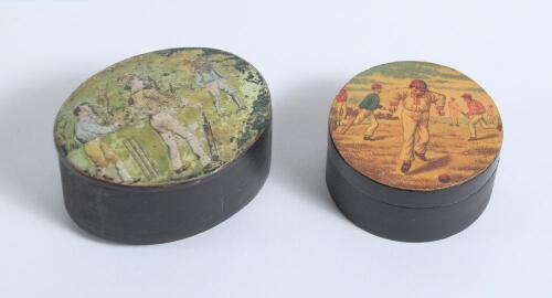 Cricket snuff box. An oval black lacquered papier mache snuff box with hinged lid, believed to be circa 1870&rsquo;s. The lid painted with a cricketing scene of boys playing cricket with trees in background. The box measures approx 2.5&rdquo; x 1.75&rdquo;x .75&rdquo; deep. Some